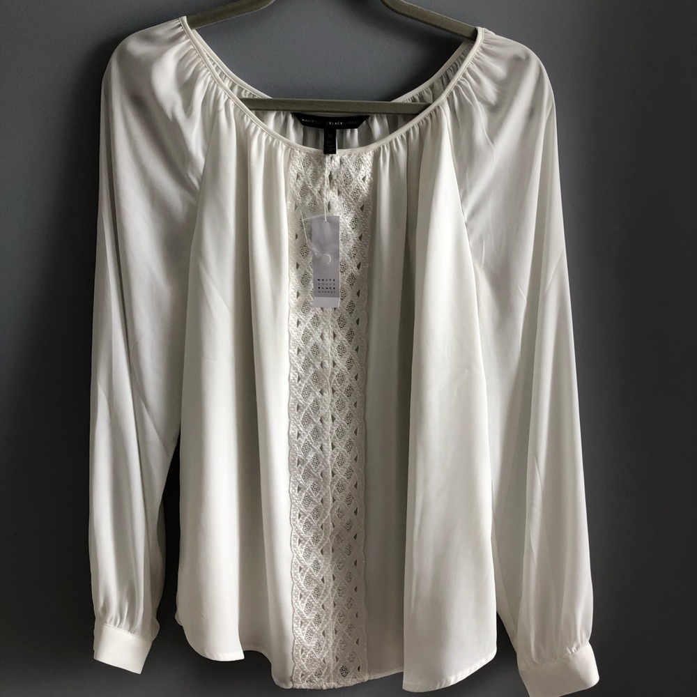White blouse with beautiful decorative placard